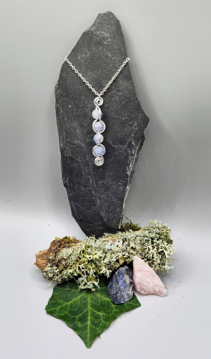 4 crackle bead back and forth pendant