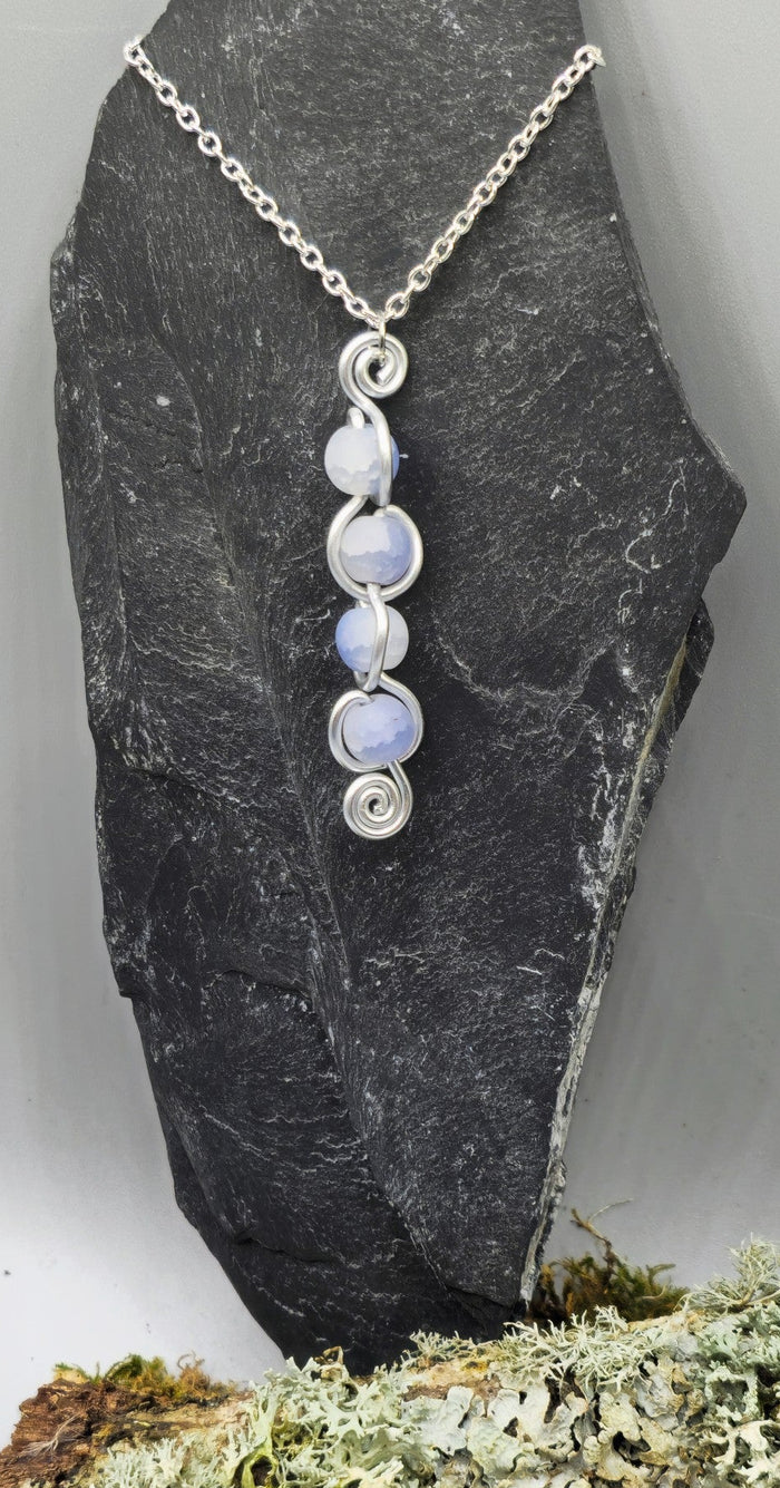 4 crackle bead back and forth pendant
