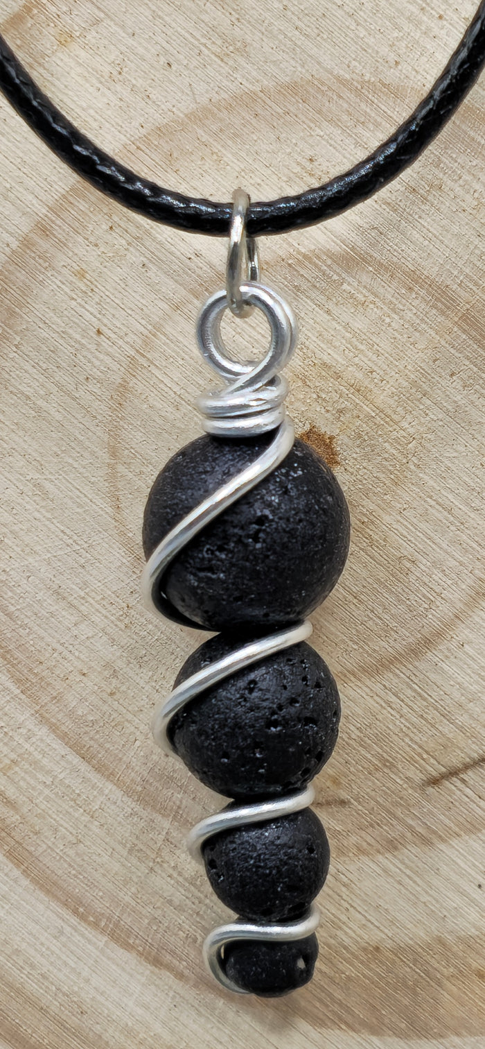 4 descending Lava stone bead pendant
