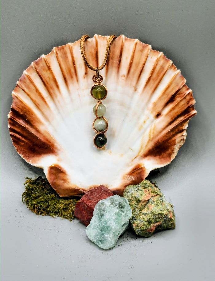 4 Jade bead back and forth pendant