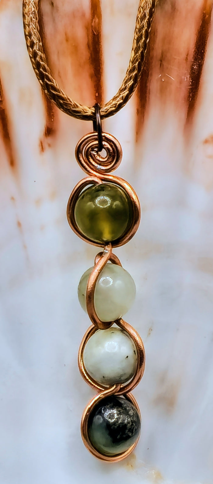 4 Jade bead back and forth pendant