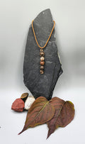 4 Rhodonite bead back and forth pendant