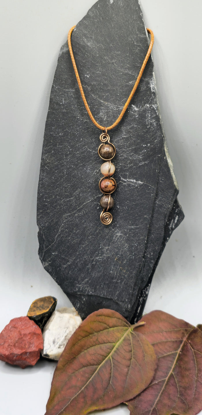 4 Rhodonite bead back and forth pendant