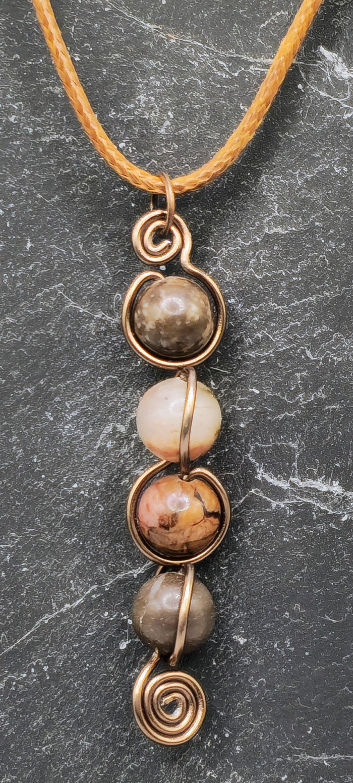 4 Rhodonite bead back and forth pendant