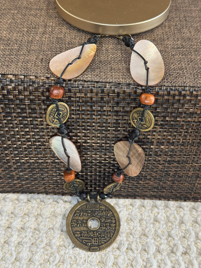 Chico’s Asian-Inspired “Mountain Ghost” Pendant Necklace | Natural Materials