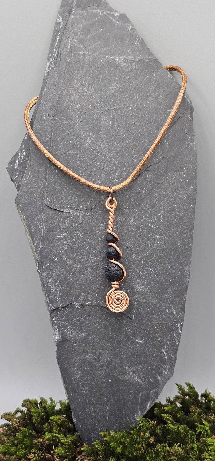 Copper and 3 lava stone pendant