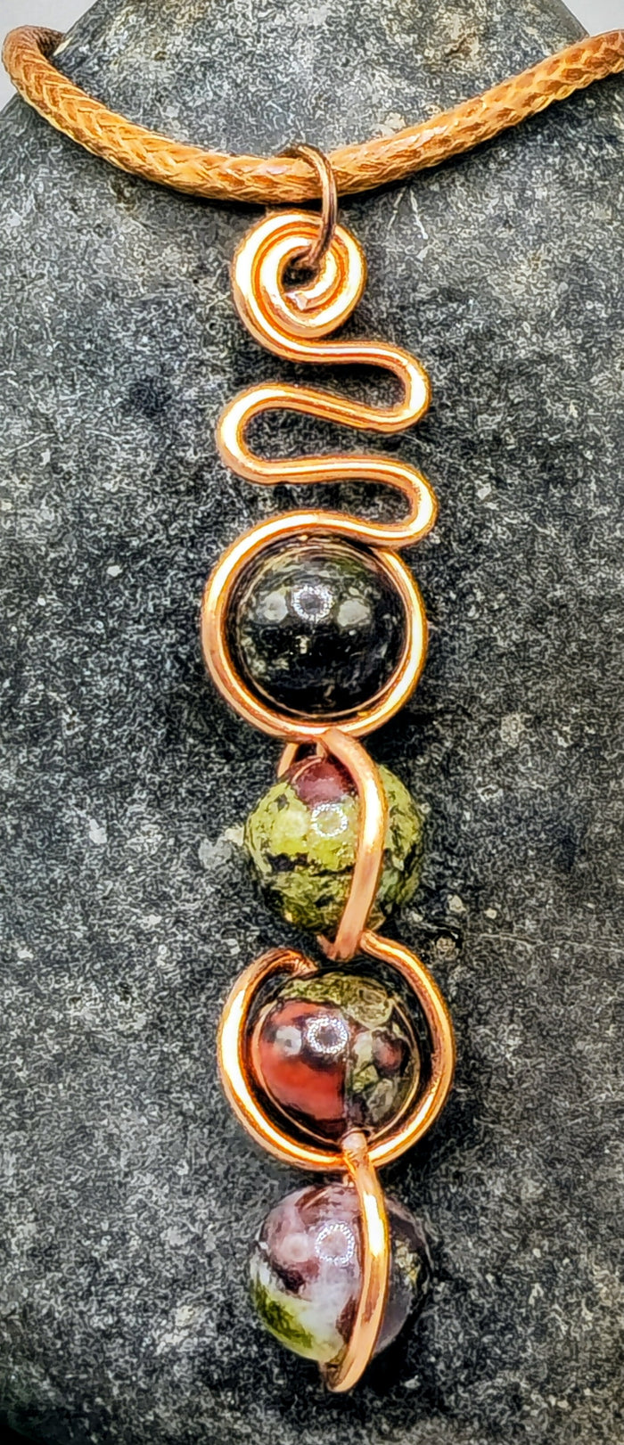 Copper coloured Dragon Blood stone pendant