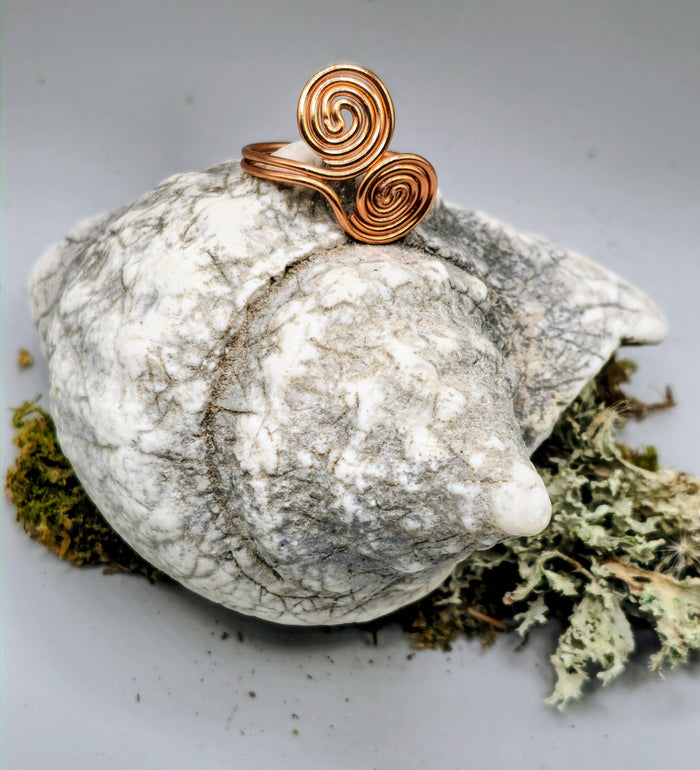 Copper coloured twin spiral ring