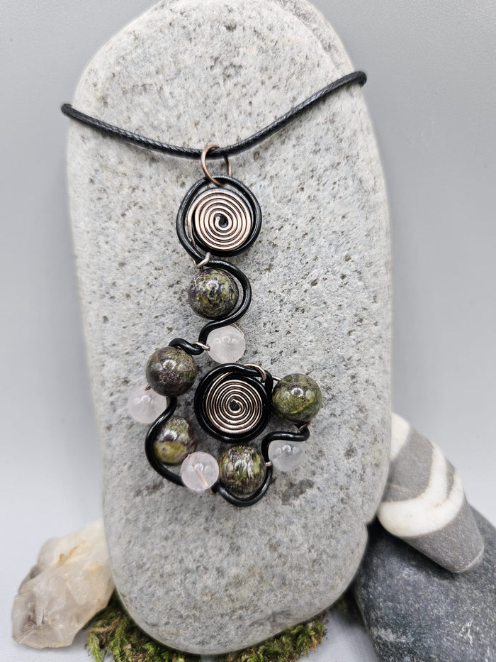 Dragon Blood and Rose Quartz whorl pendant