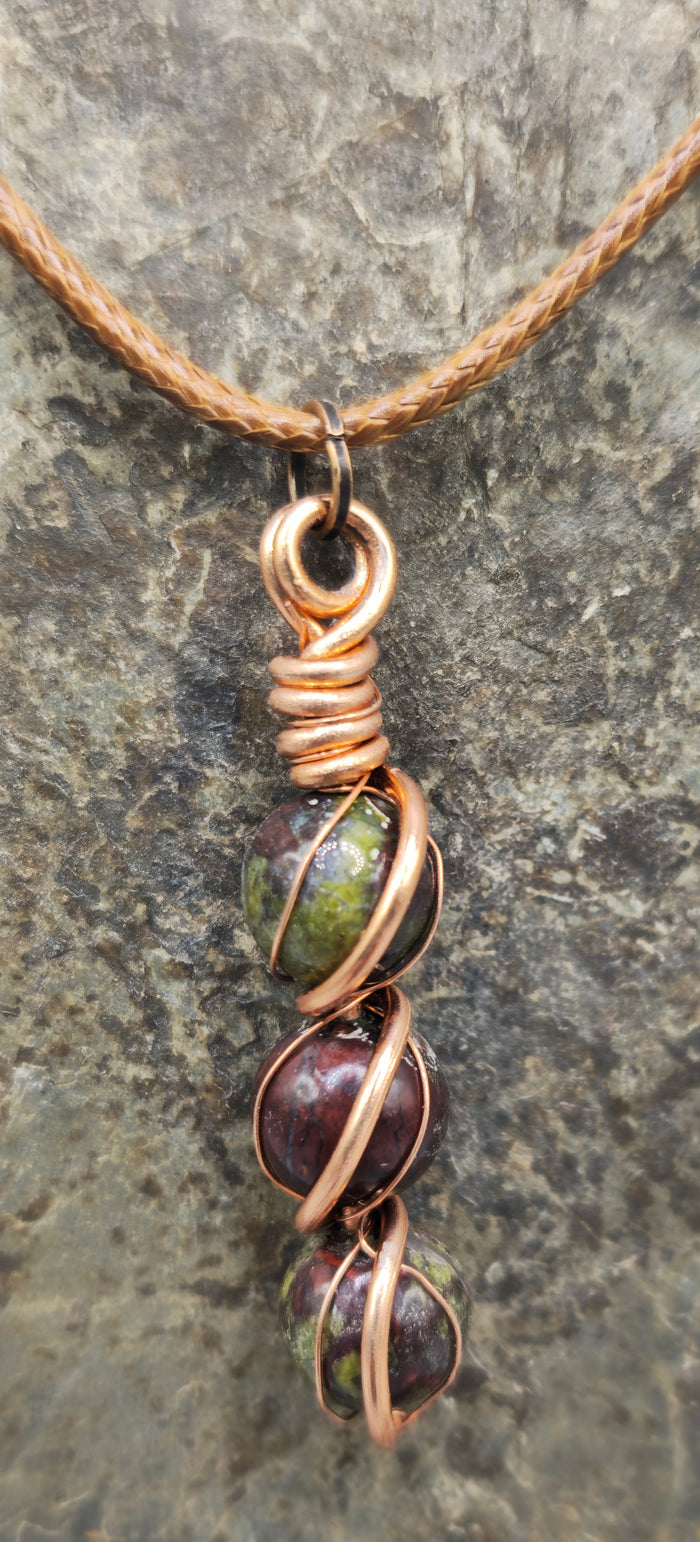 Dragon Blood stone delicate wrapped pendant