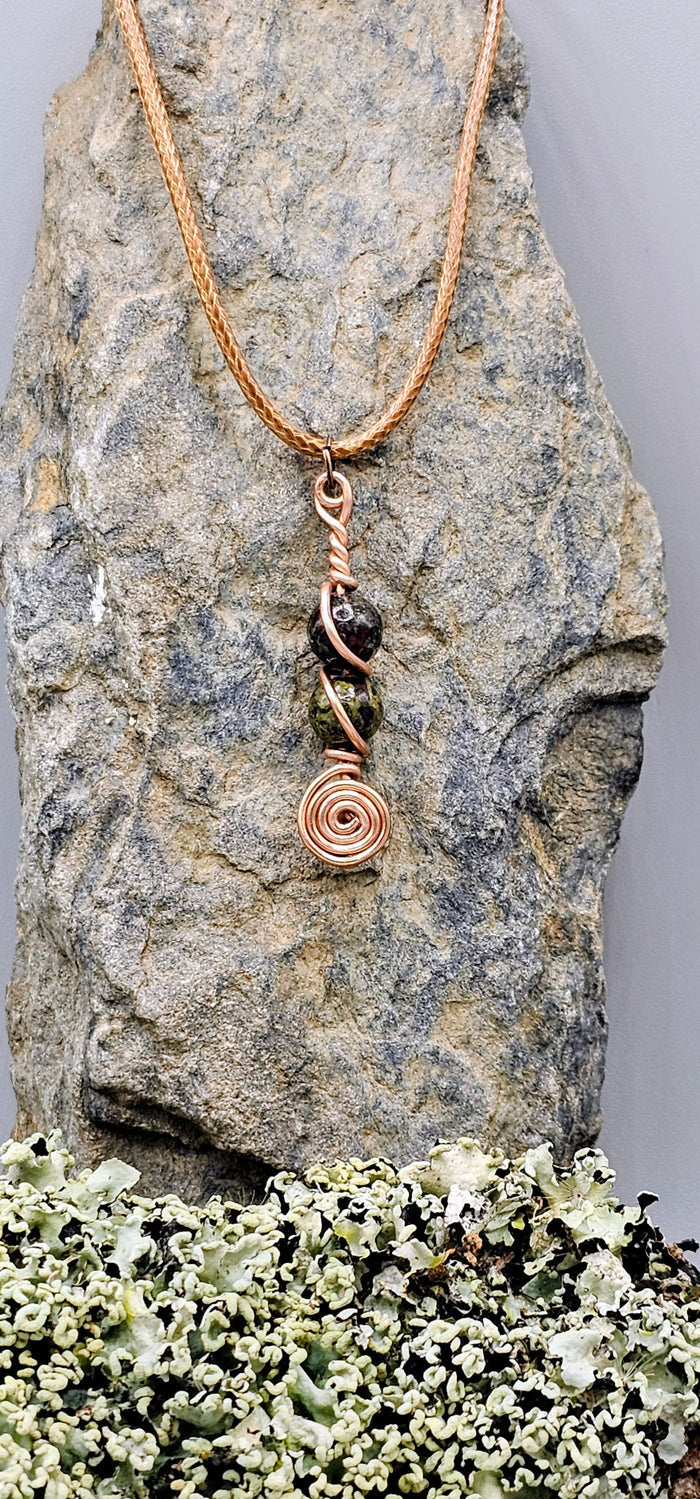 Dragon Blood stone spiral pendant