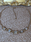 Gold-Tone Reversible Statement Necklace with Clear Crystals & Black Stones