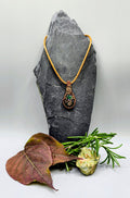 Intricate brown wire-wrapped stone pendant