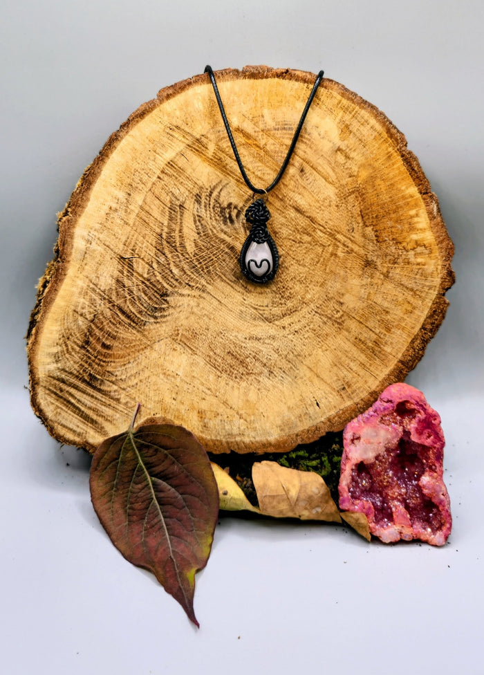 Intricate wire wrapped heart pendant