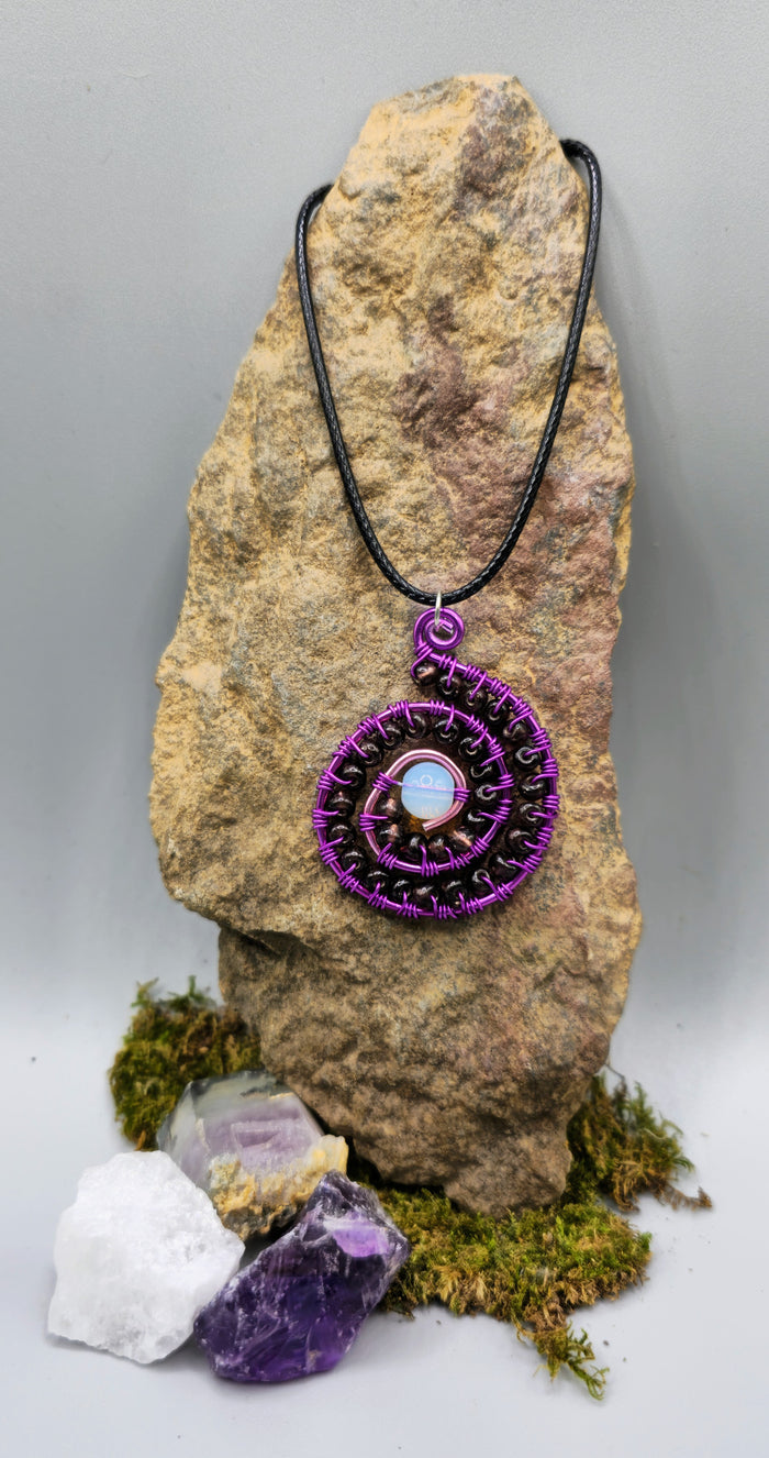 Opalite and purple beaded spiral pendant
