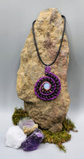 Opalite and purple beaded spiral pendant