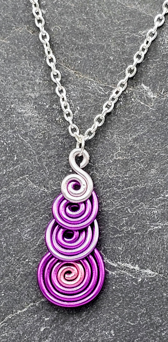 Pink ombre spiral pendant