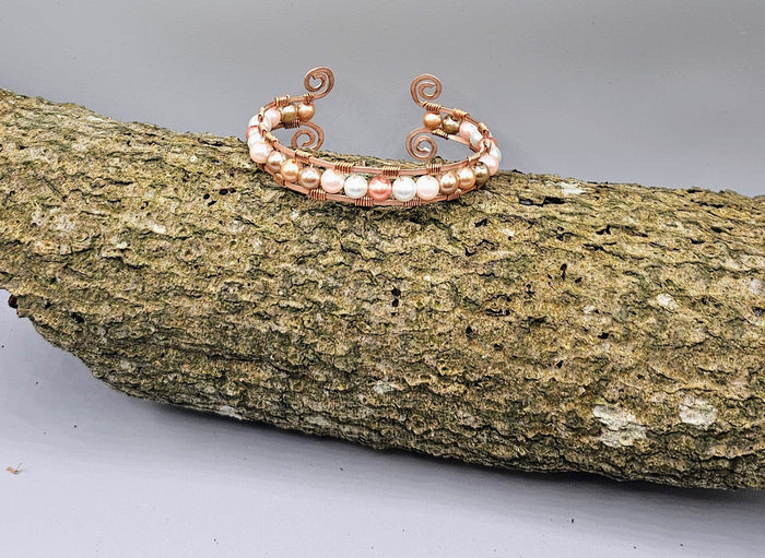 Pink tone pearl bead bracelet