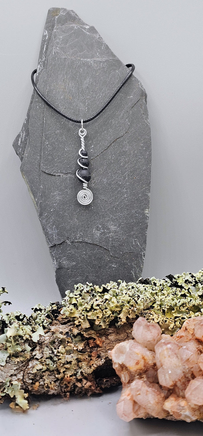Silver and 3 lava stone pendant