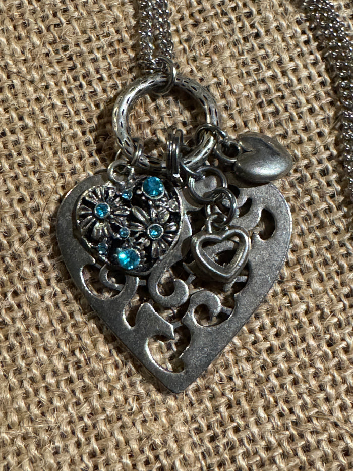 Silver-Tone Filigree Heart Pendant Necklace with Blue Crystal Accents