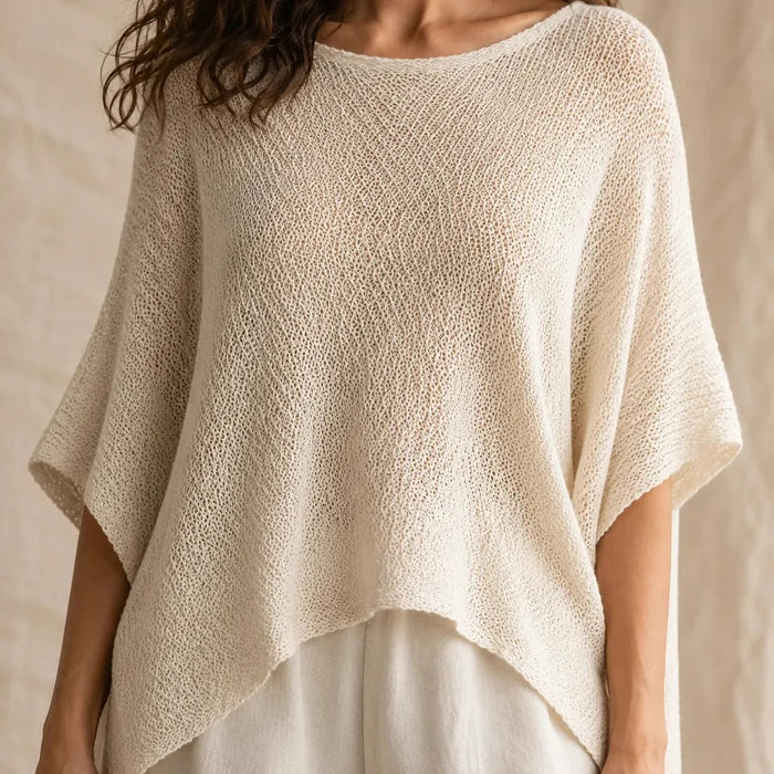Solvera – Open Knit Batwing Top with Asymmetric Hem