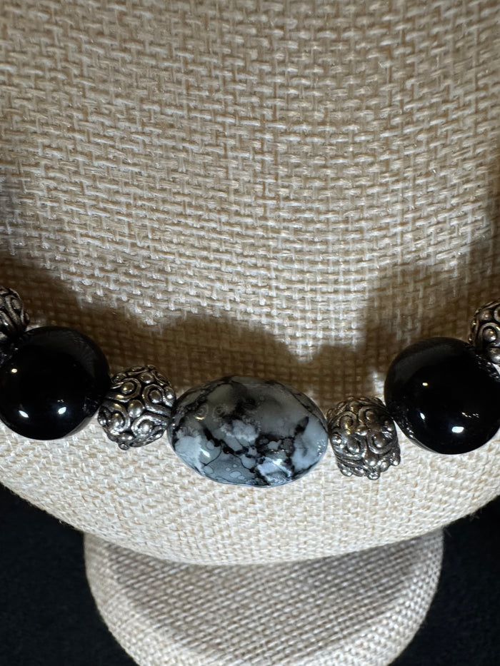 Statement Graduated Black Bead & Ornate Silver-Tone Necklace — Sculptural Elegance & Timeless Presence
