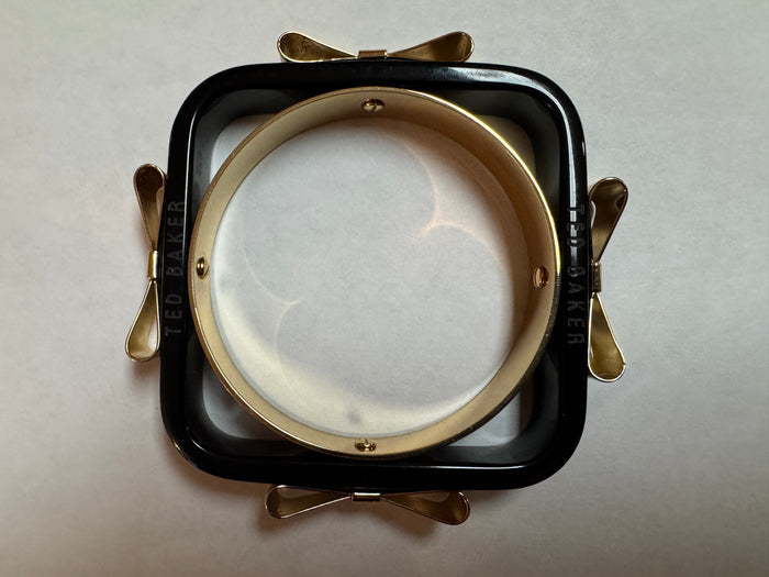 Ted Baker London Logo Acrylic Bow Bangle — Black and Gold Tone