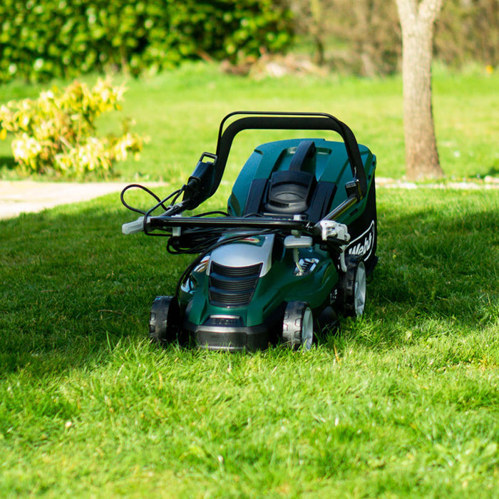 Webb Classic 40cm Electric Rotary Lawnmower on grass in garden