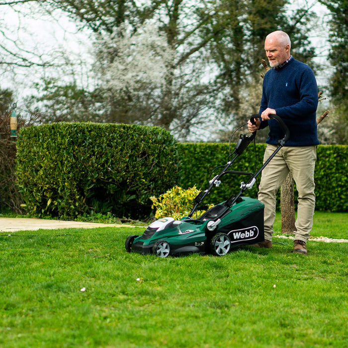 Webb Classic 40cm Electric Rotary Lawnmower being pushed by man